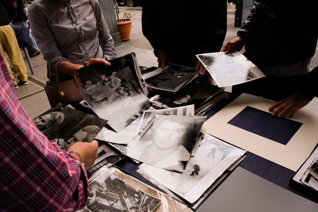 People viewing photographs at an exhibition